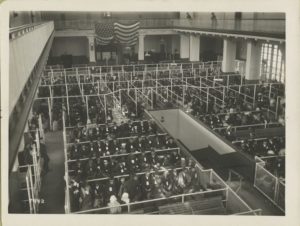 Pens at Ellis Island Registry Room. These People Have Passed the First Mental Inspection, courtesy Miriam and Ira Wallach Division of Art, Printing, and Photography Collection, New York Public Library